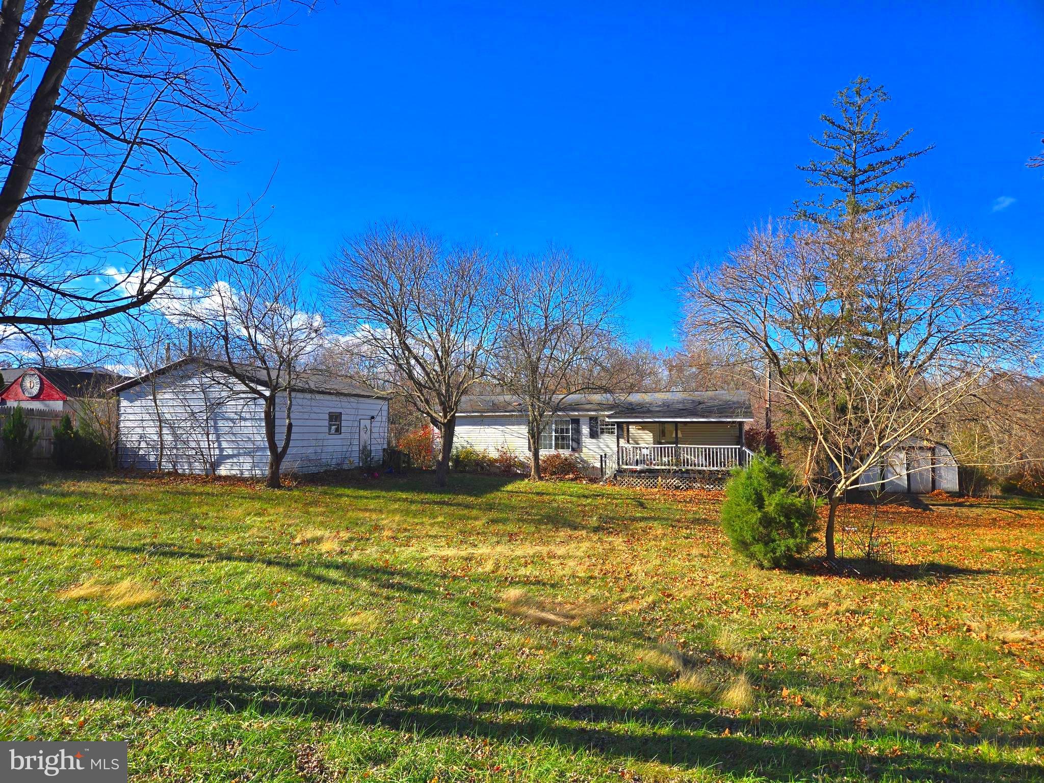 196 Foster Drive Falling Waters, WV 25419 - Photo 6 of 50 a view of a house with a big yard
