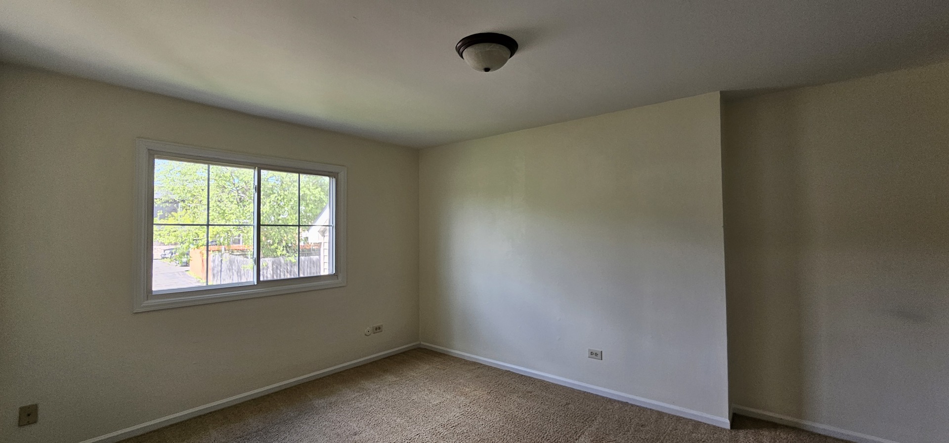 833 Village Quarter Road, Unit A3 West Dundee, IL 60118 - Photo 17 of 27 an empty room with a window