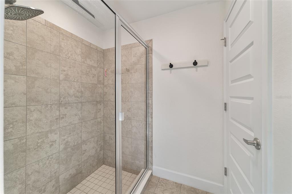 9155 Southeast 47th Court Road Ocala, FL 34480 - Photo 31 of 47 a bathroom with a shower