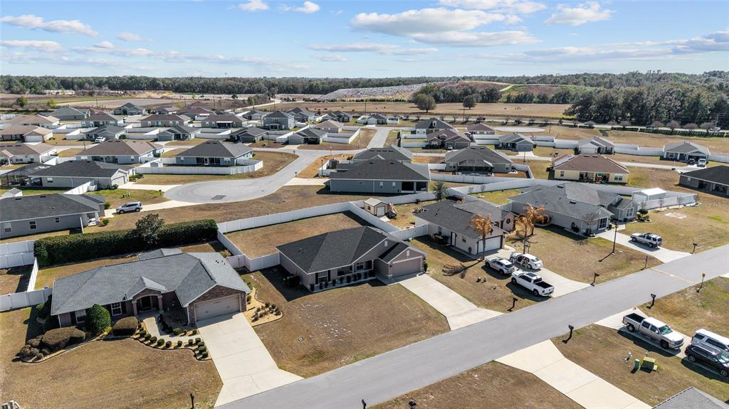 9155 Southeast 47th Court Road Ocala, FL 34480 - Photo 45 of 47 an aerial view of a city with lots of residential buildings