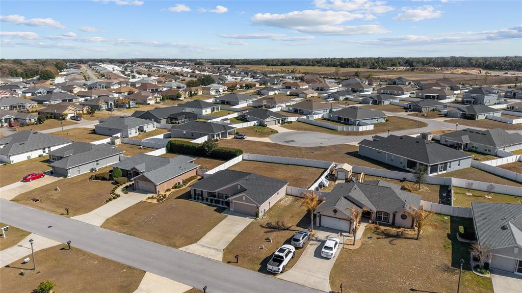 9155 Southeast 47th Court Road Ocala, FL 34480 - Photo 46 of 47 an aerial view of a city