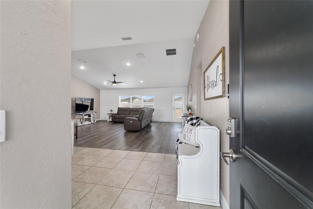 9155 Southeast 47th Court Road Ocala, FL 34480 - Photo 6 of 47 a bathroom with a sink a mirror and shower