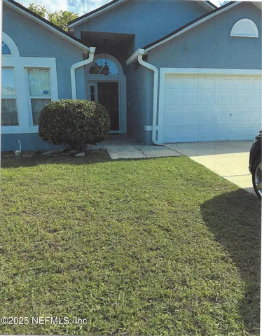 a house view with a outdoor space