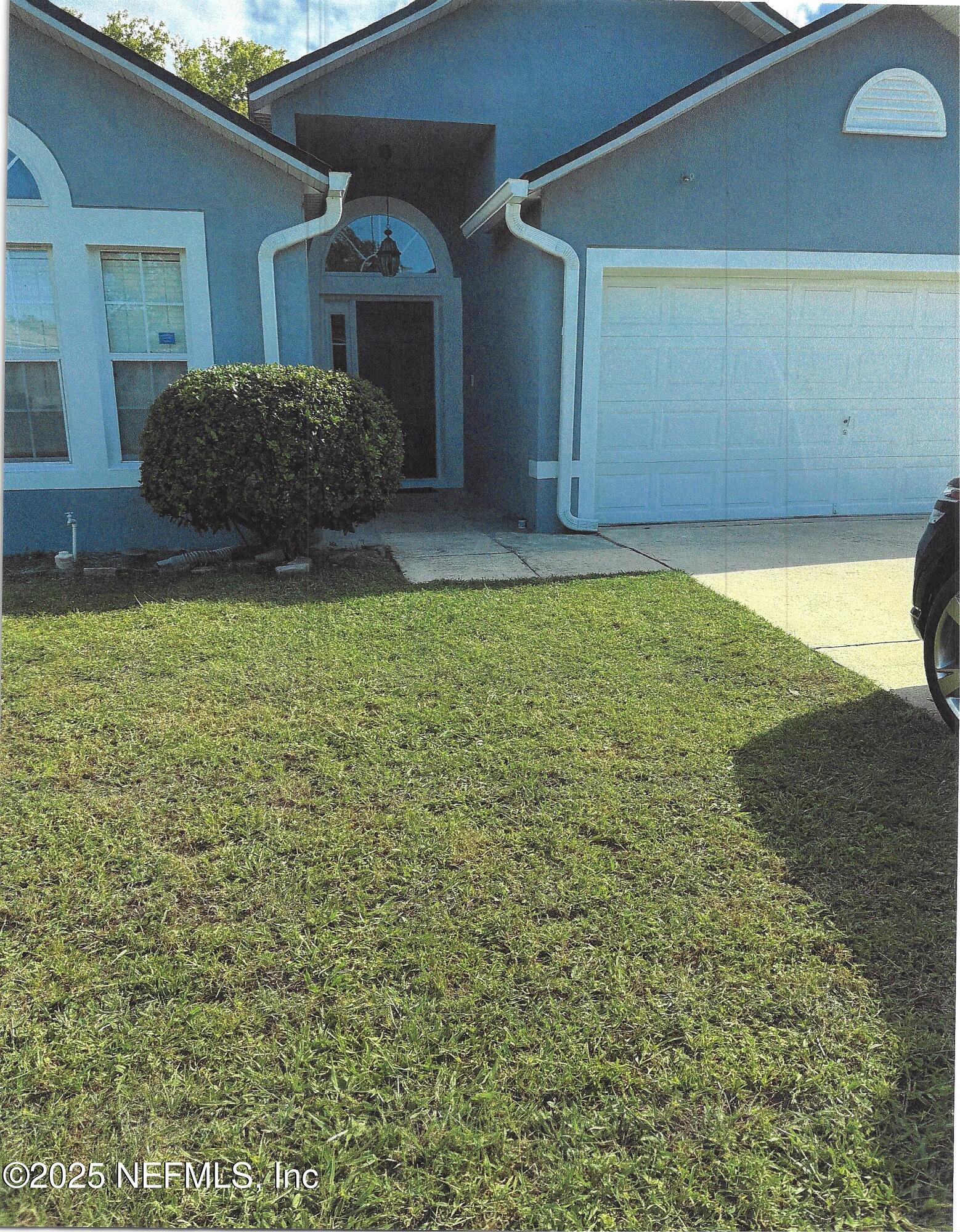 a house view with a outdoor space