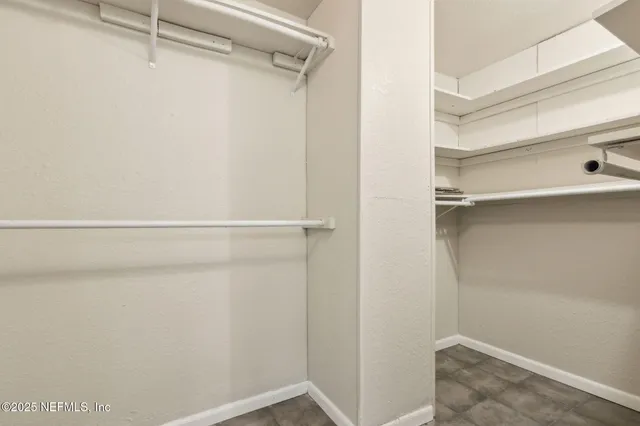 a view of a room with racks on the wall