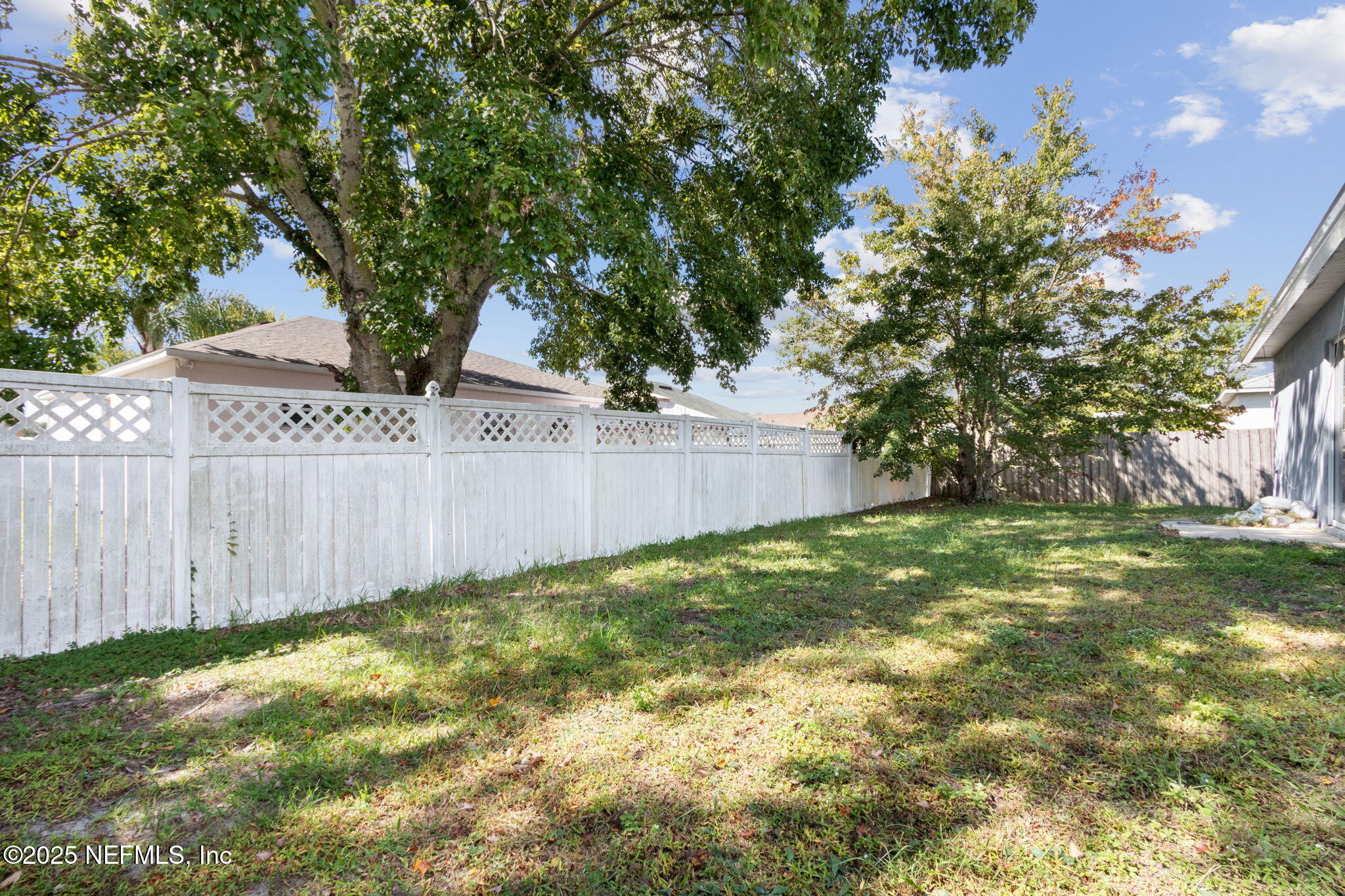 7364 Edenfield Park Road Jacksonville, FL 32244 - Photo 31 of 31 a view of backyard with tree