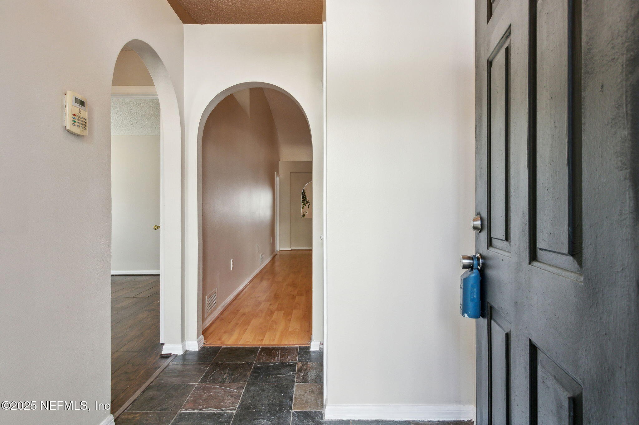 7364 Edenfield Park Road Jacksonville, FL 32244 - Photo 8 of 31 a view of an entryway with staircase