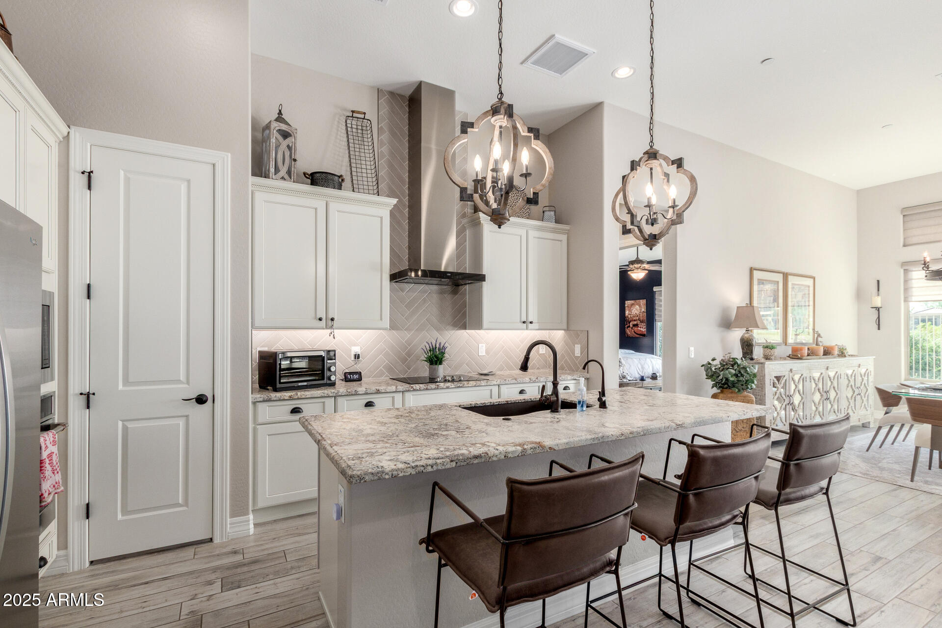 18805 East Blue Sky Drive Rio Verde, AZ 85263 - Photo 12 of 43 a view of a kitchen and dining room