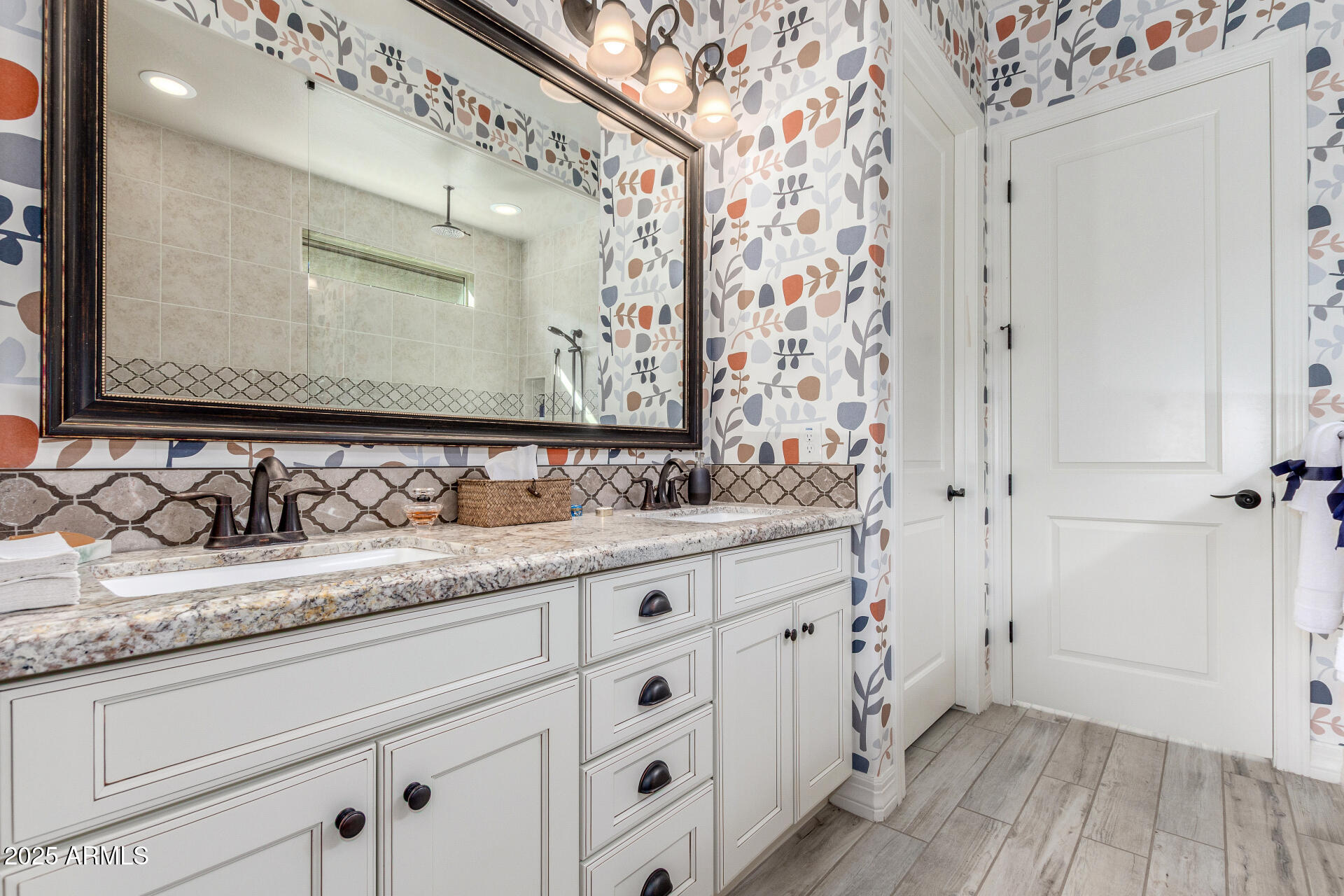 18805 East Blue Sky Drive Rio Verde, AZ 85263 - Photo 17 of 43 a bathroom with a granite countertop sink and a mirror