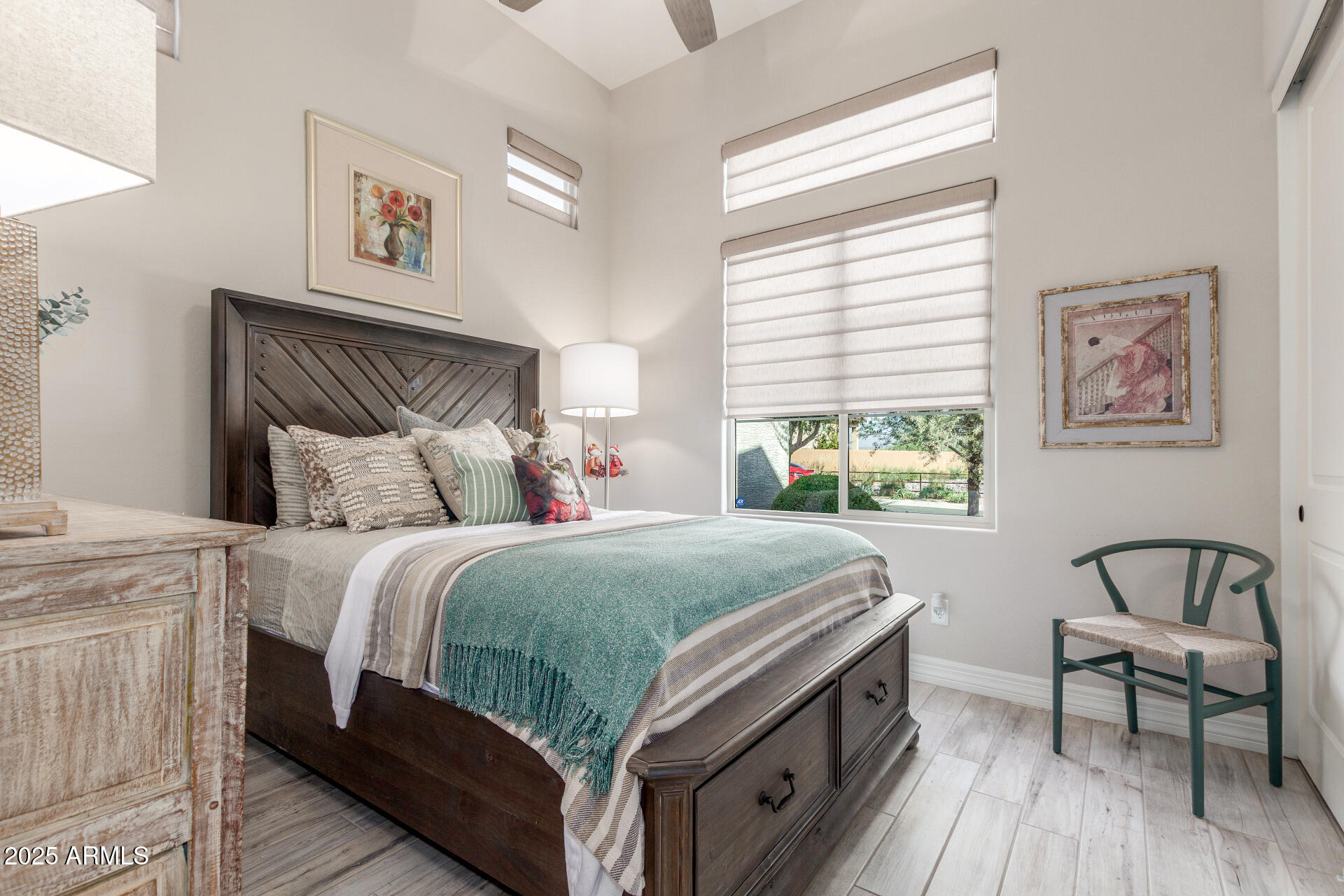 18805 East Blue Sky Drive Rio Verde, AZ 85263 - Photo 20 of 43 a bedroom with a bed and a table with window