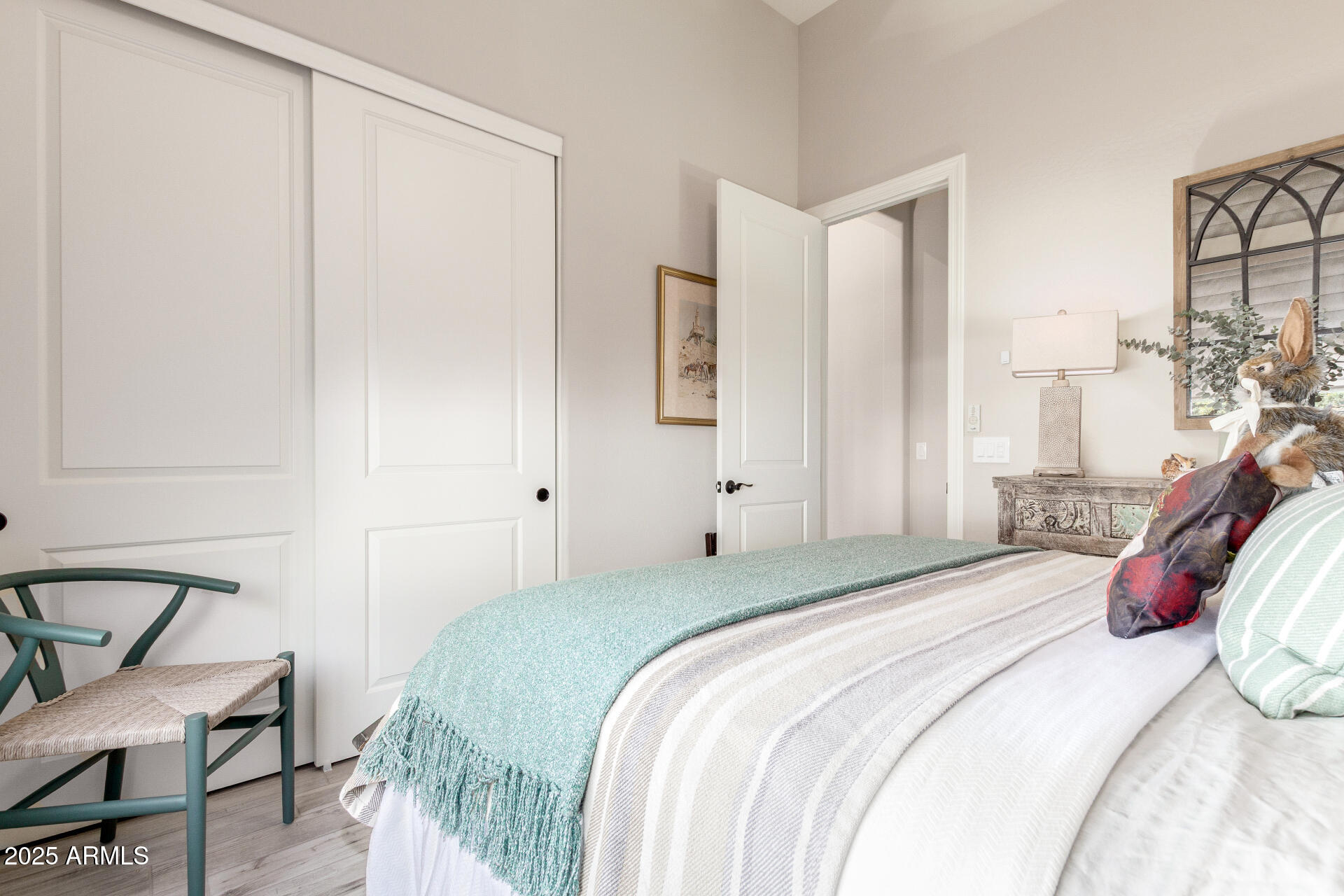 18805 East Blue Sky Drive Rio Verde, AZ 85263 - Photo 21 of 43 a bedroom with a bed and a chair