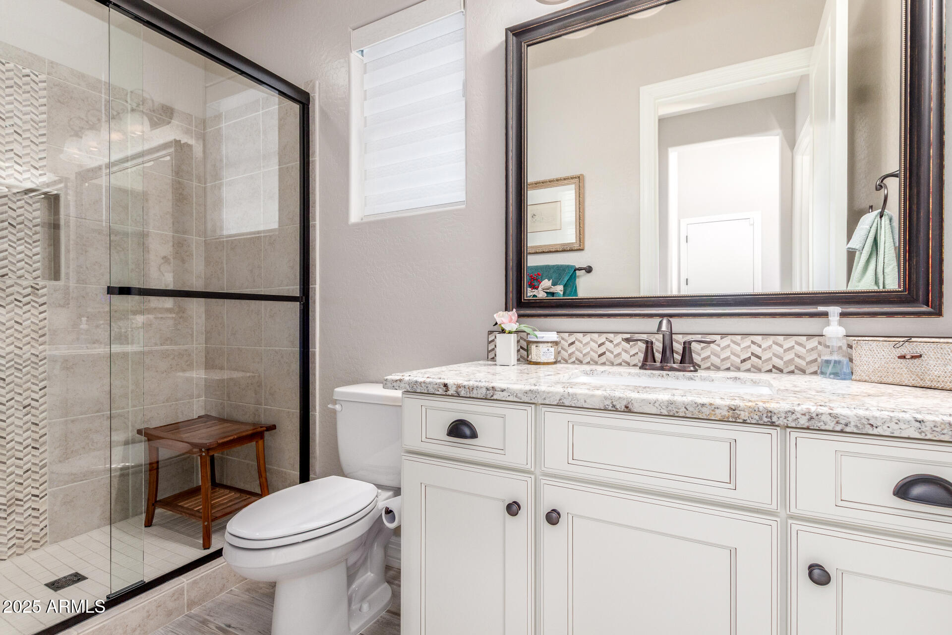 18805 East Blue Sky Drive Rio Verde, AZ 85263 - Photo 22 of 43 a bathroom with a granite countertop sink mirror vanity and toilet