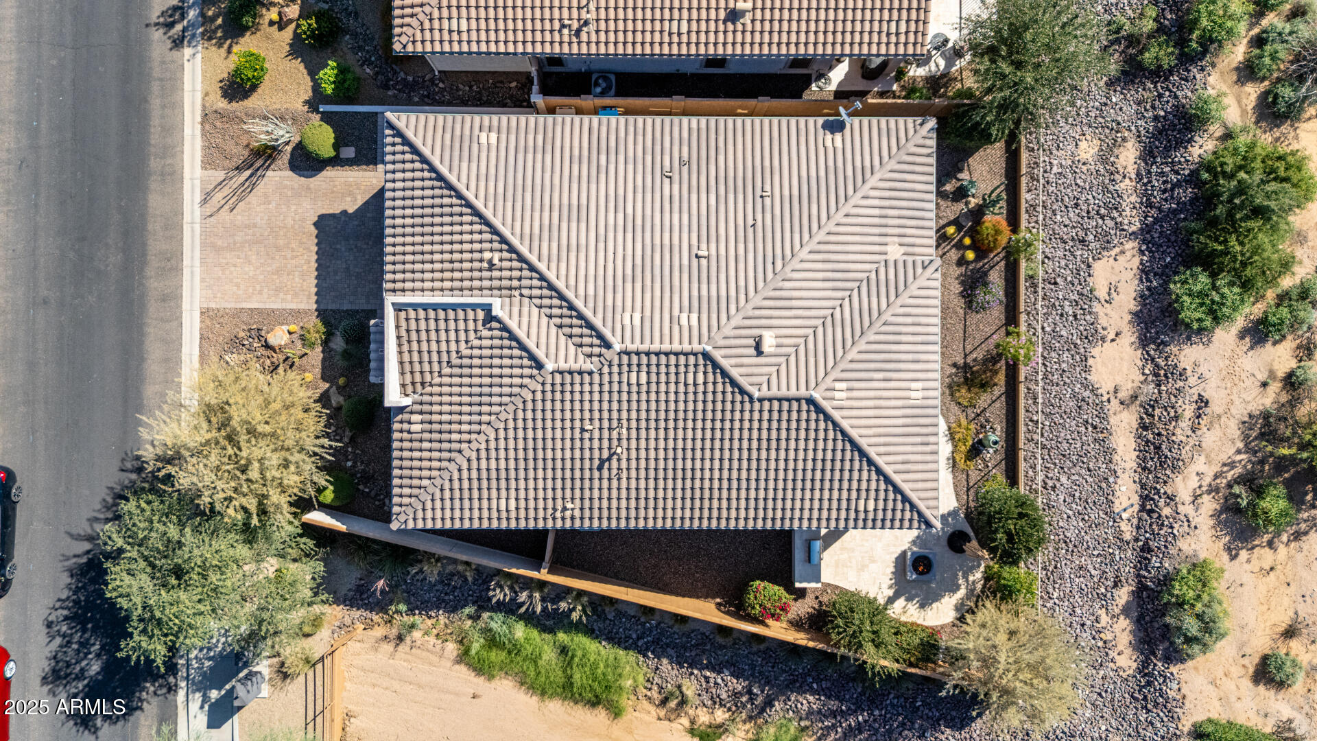 18805 East Blue Sky Drive Rio Verde, AZ 85263 - Photo 36 of 43 a front view of a house with a garden