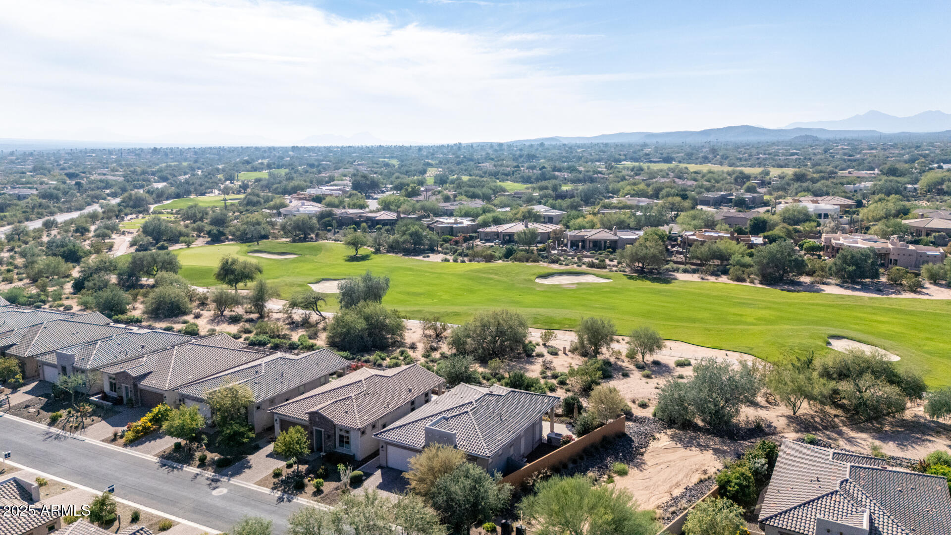 18805 East Blue Sky Drive Rio Verde, AZ 85263 - Photo 37 of 43 an aerial view of a city with lots of residential buildings