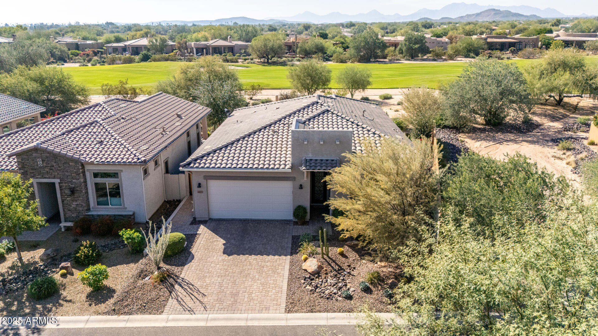 18805 East Blue Sky Drive Rio Verde, AZ 85263 - Photo 4 of 43 a view of a house with a yard and a floor to ceiling window