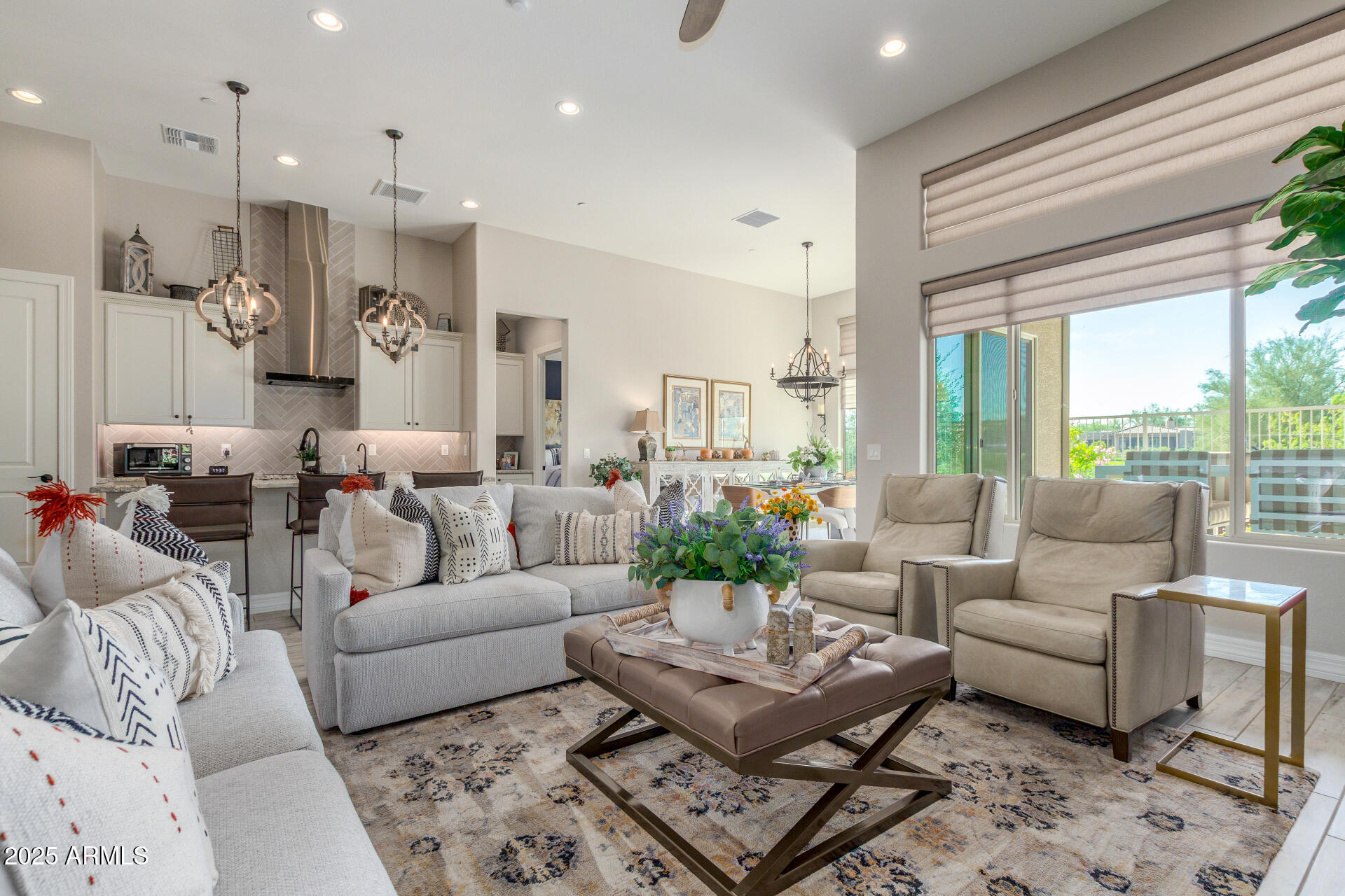 18805 East Blue Sky Drive Rio Verde, AZ 85263 - Photo 9 of 43 a living room with furniture and a large window