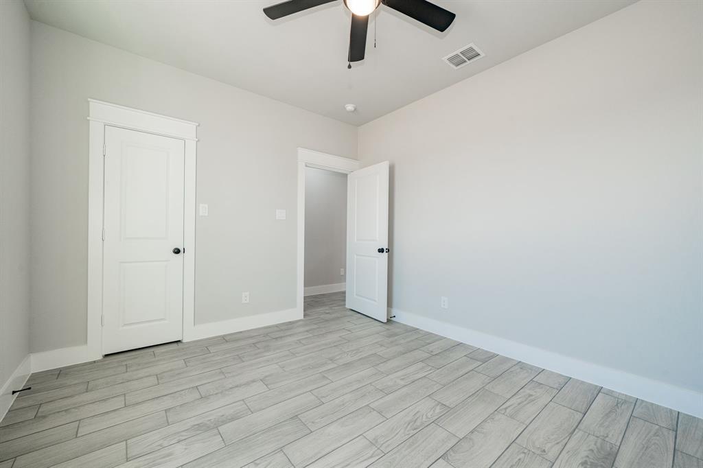 2017 Swallowtail Court Poolville, TX 76487 - Photo 26 of 32 wooden floor in an empty room