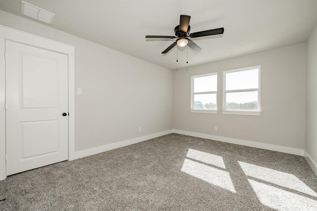 2017 Swallowtail Court Poolville, TX 76487 - Photo 29 of 32 a view of empty room with ceiling fan