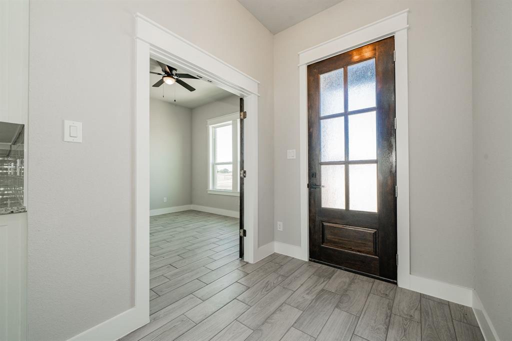 2017 Swallowtail Court Poolville, TX 76487 - Photo 7 of 32 wooden floor in a room