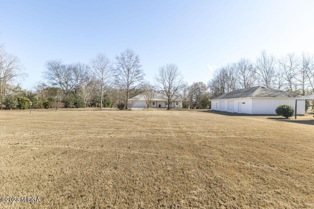 6375 Barfield Road Macon, GA 31216 - Photo 13 of 60 a view of yard covered with snow in front of house