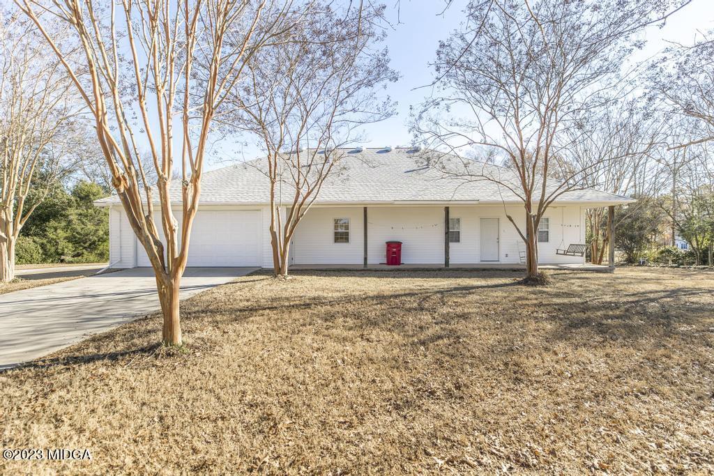 6375 Barfield Road Macon, GA 31216 - Photo 20 of 60 a view of a house with a yard covered with snow