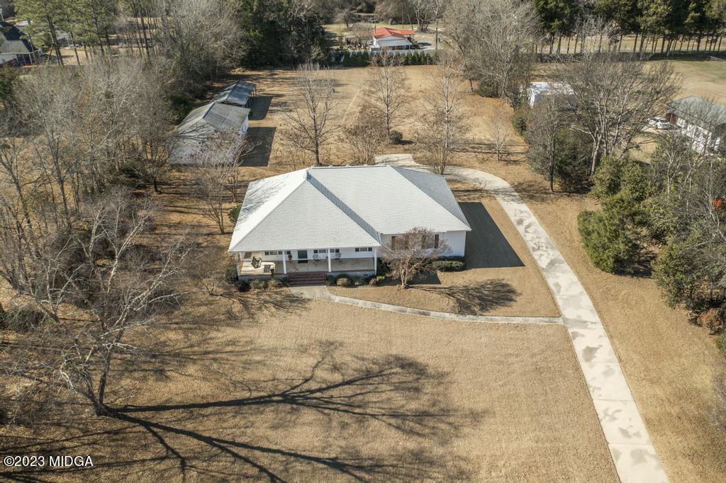 6375 Barfield Road Macon, GA 31216 - Photo 31 of 60 a view of a house with a yard