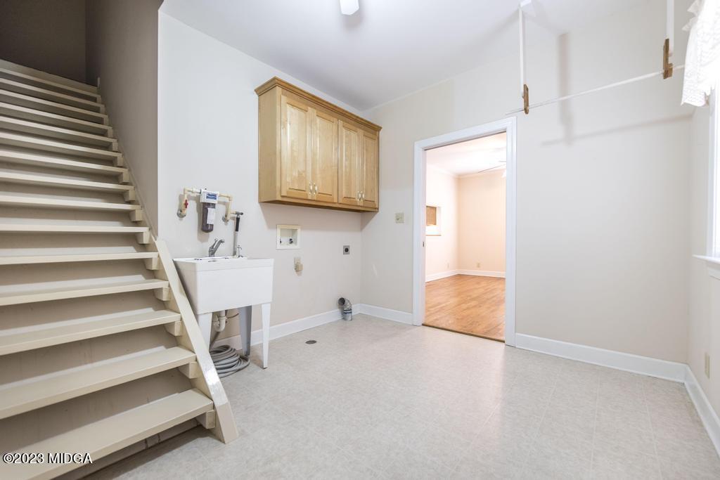 6375 Barfield Road Macon, GA 31216 - Photo 32 of 60 a view of entryway with wooden floor and chair