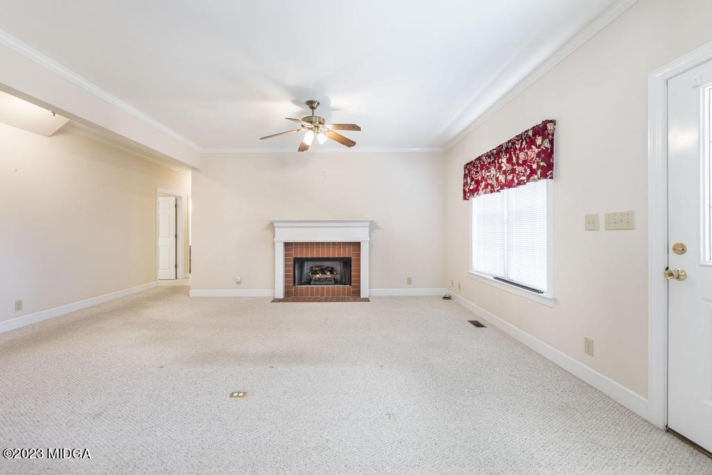 6375 Barfield Road Macon, GA 31216 - Photo 52 of 60 an empty room with windows and fan