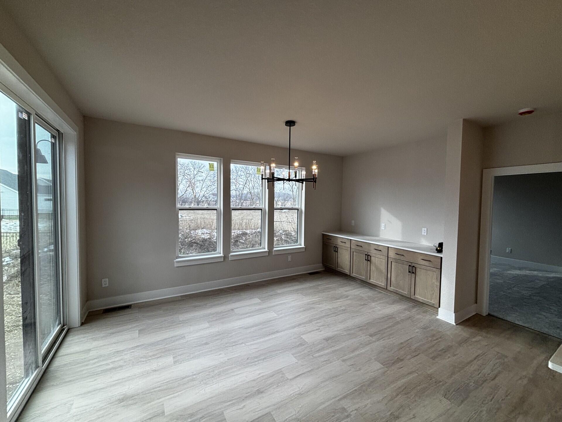 1333 Periwinkle Pass Oconomowoc, WI 53066 - Photo 5 of 10 Dining room
