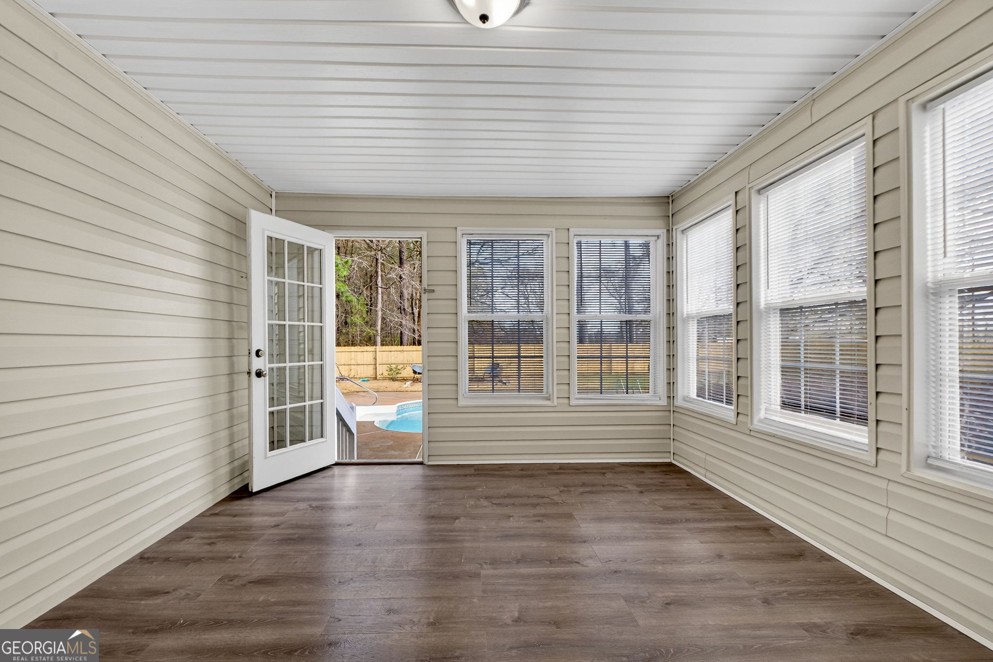 108 Whippoorwill Ridge Road Jackson, GA 30233 - Photo 18 of 39 a view of empty room with wooden floor and windows