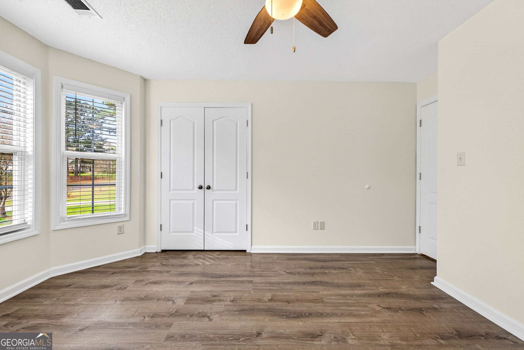 108 Whippoorwill Ridge Road Jackson, GA 30233 - Photo 27 of 39 an empty room with window