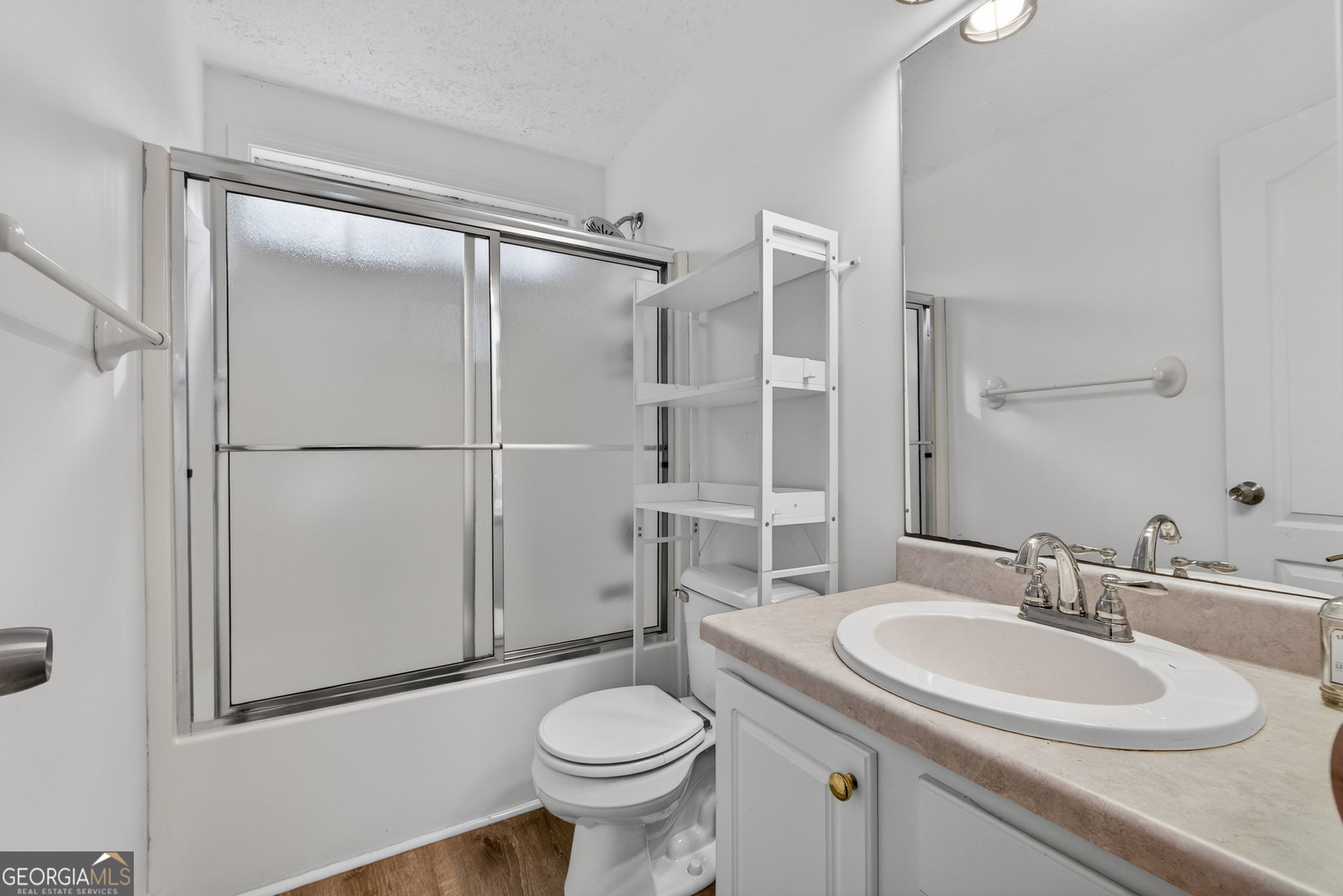 108 Whippoorwill Ridge Road Jackson, GA 30233 - Photo 28 of 39 a bathroom with a sink toilet and shower