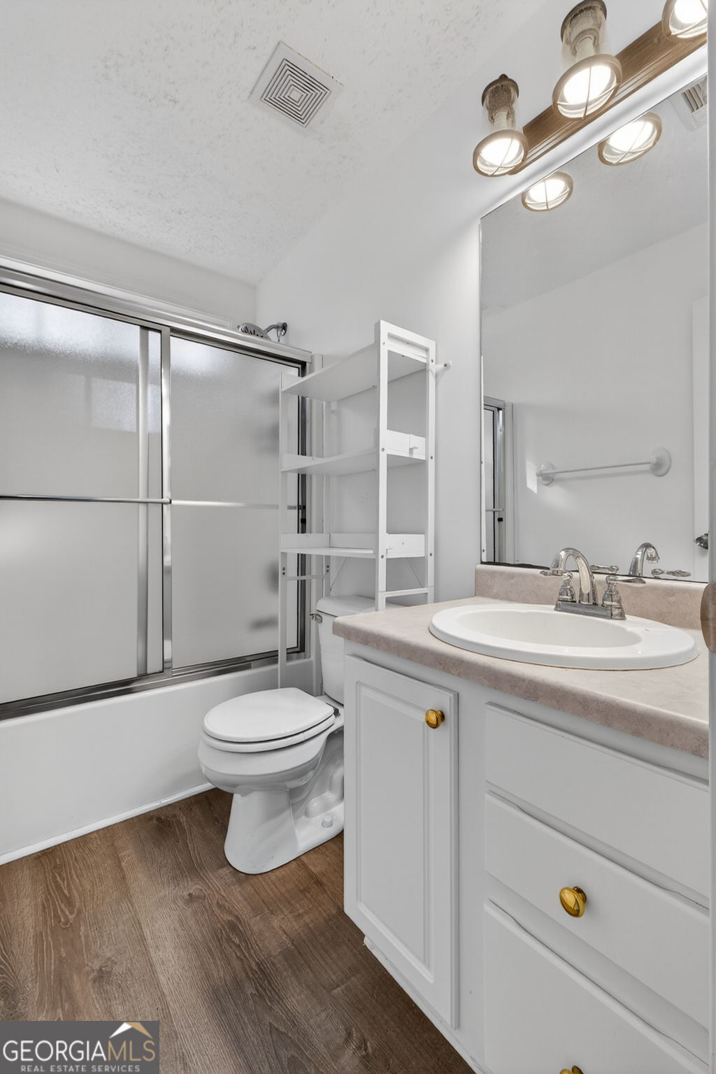 108 Whippoorwill Ridge Road Jackson, GA 30233 - Photo 29 of 39 a bathroom with a sink a toilet and shower