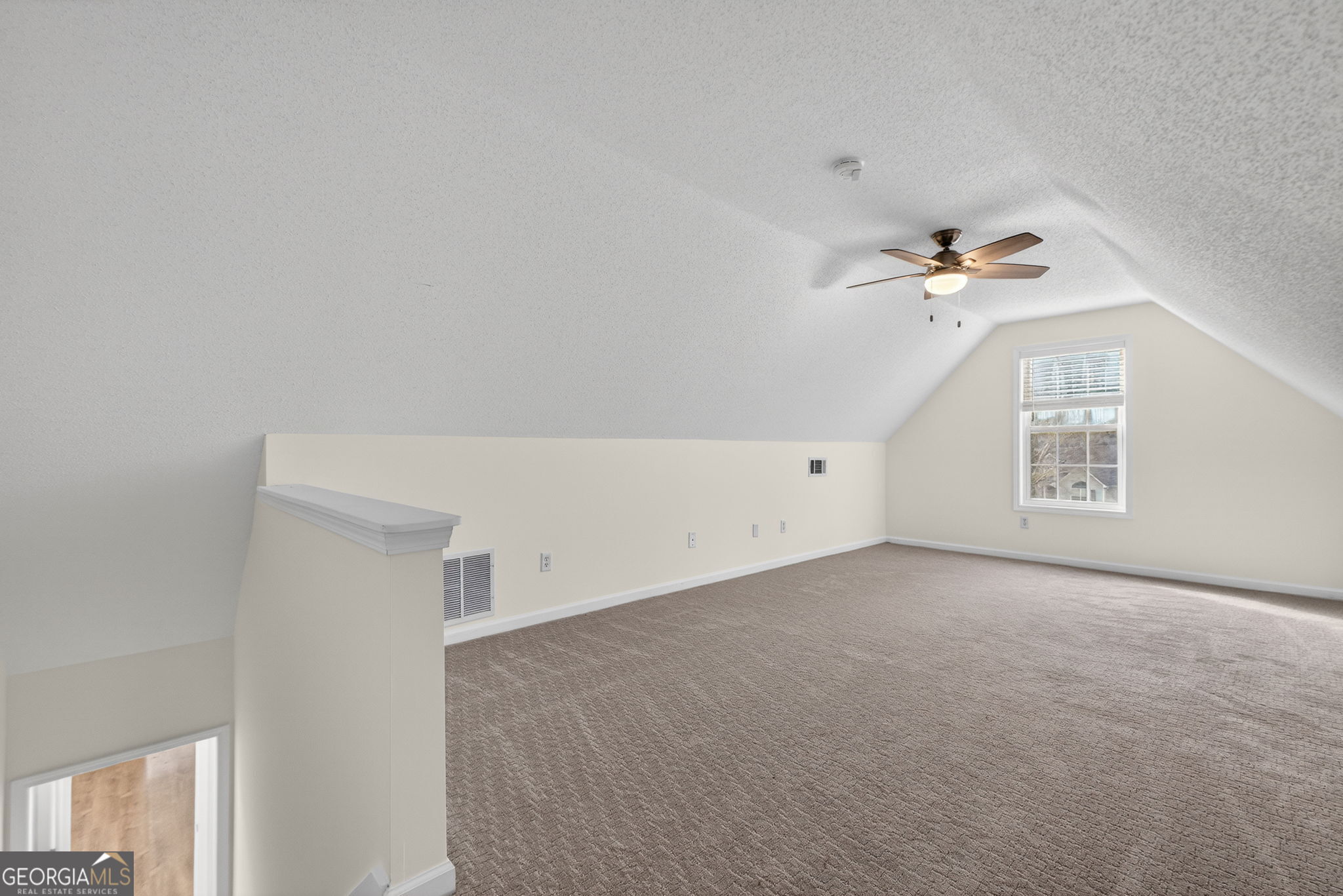 108 Whippoorwill Ridge Road Jackson, GA 30233 - Photo 32 of 39 a view of an empty room with a window