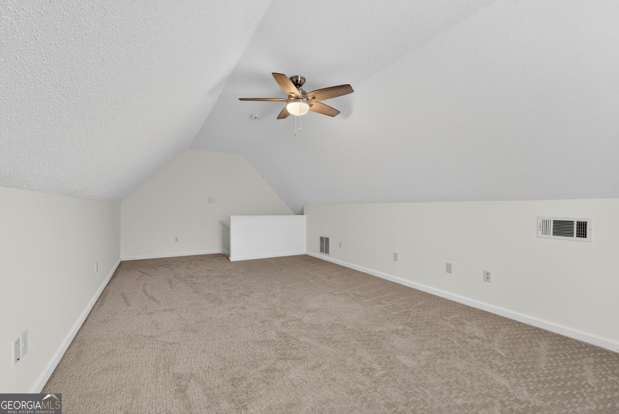 108 Whippoorwill Ridge Road Jackson, GA 30233 - Photo 34 of 39 an empty room with a ceiling fan and window