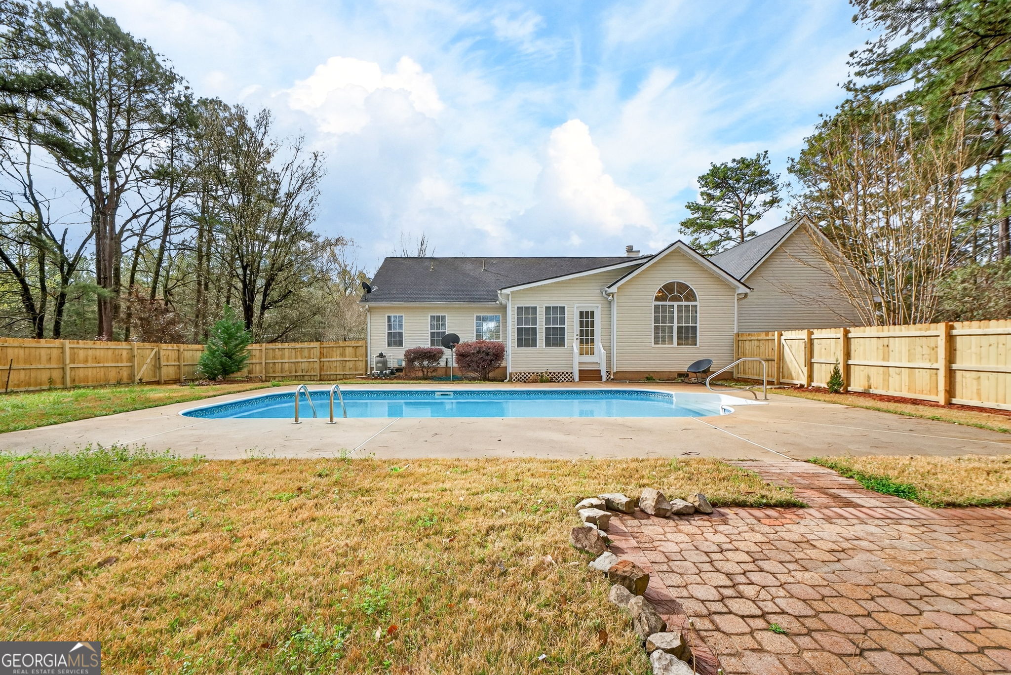 108 Whippoorwill Ridge Road Jackson, GA 30233 - Photo 36 of 39 a view of house with swimming pool and sitting area