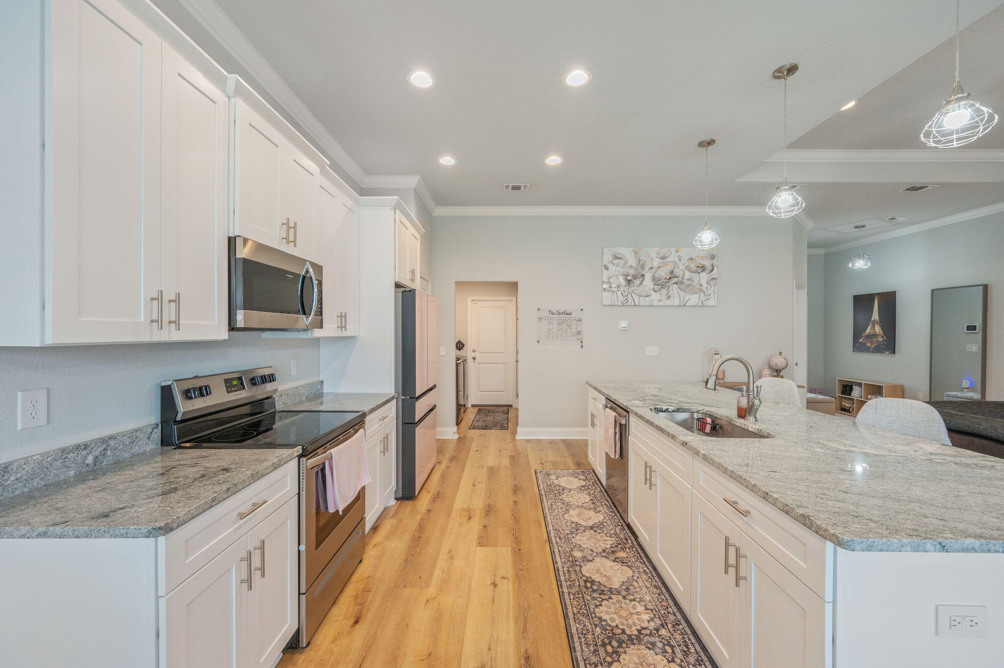 899 Al Hammett Road Mary Esther, FL 32569 - Photo 2 of 34 a large kitchen with stainless steel appliances granite countertop a lot of counter space and a sink