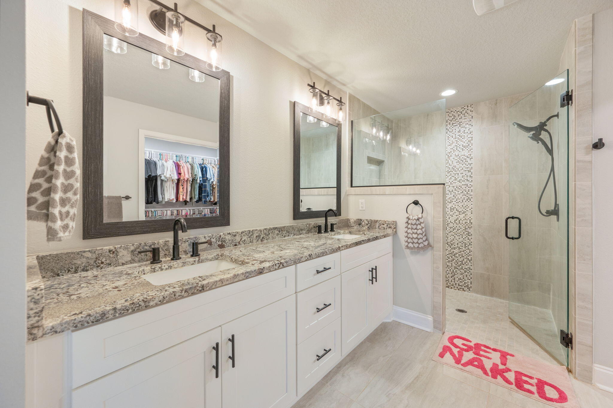 899 Al Hammett Road Mary Esther, FL 32569 - Photo 26 of 34 a bathroom with a granite countertop sink mirror and shower