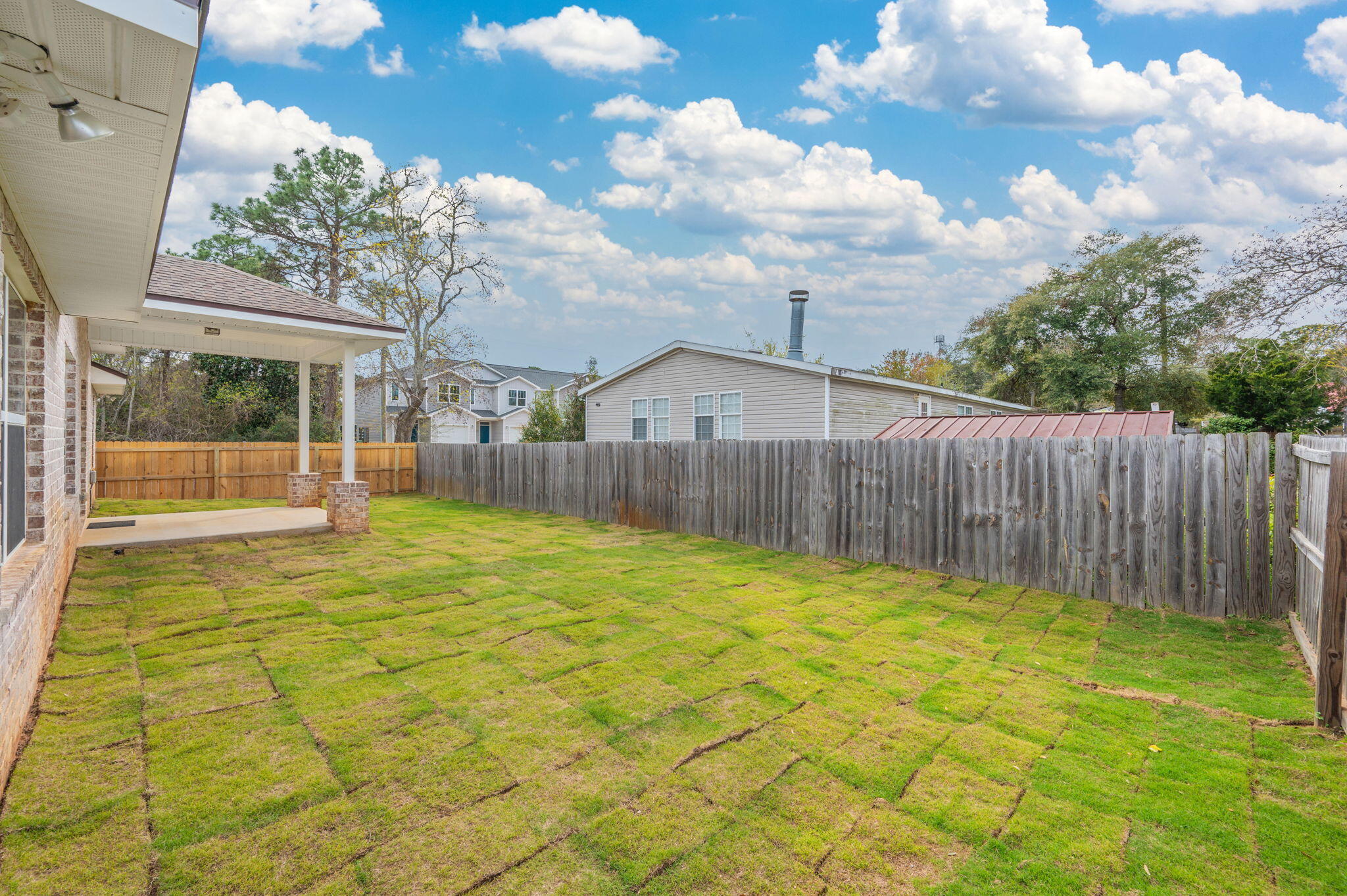 899 Al Hammett Road Mary Esther, FL 32569 - Photo 34 of 34 a view of a backyard