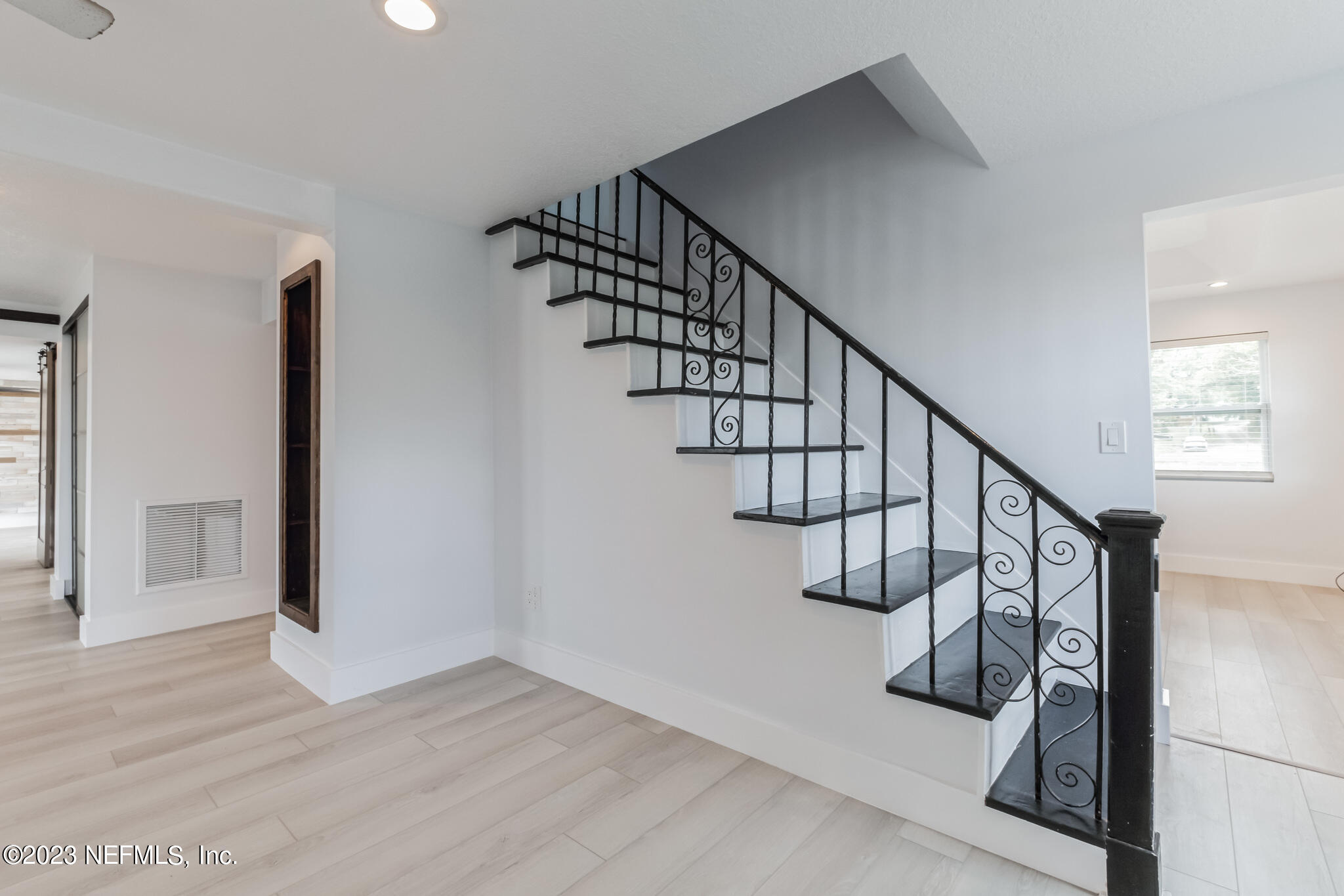 3307 Trout River Boulevard Jacksonville, FL 32208 - Photo 17 of 37 a view of entryway and hall with wooden floor