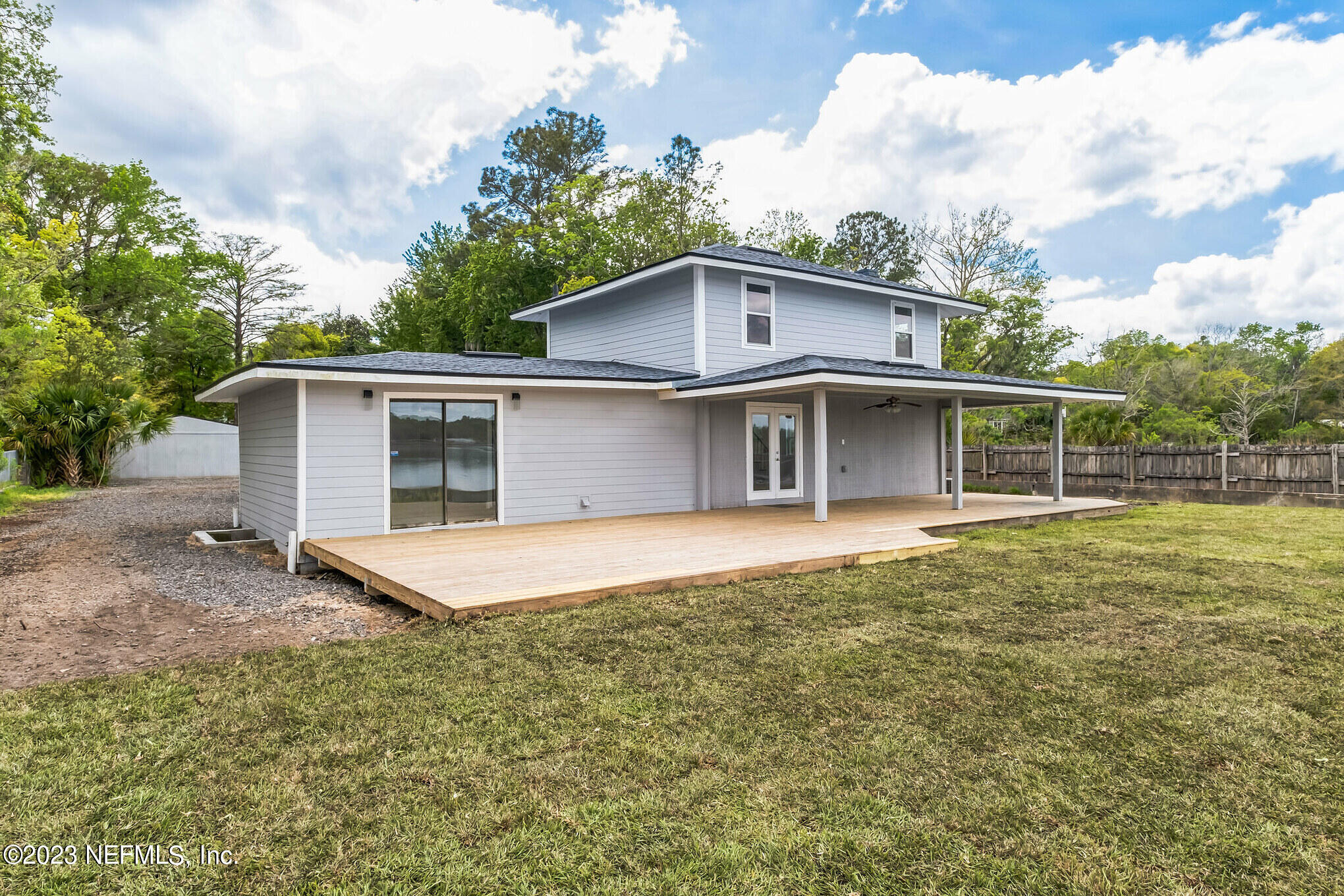 3307 Trout River Boulevard Jacksonville, FL 32208 - Photo 32 of 37 a view of a house with a backyard