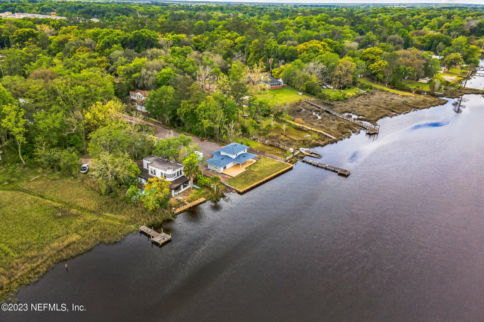 3307 Trout River Boulevard Jacksonville, FL 32208 - Photo 37 of 37 an aerial view of a house with a yard and garden