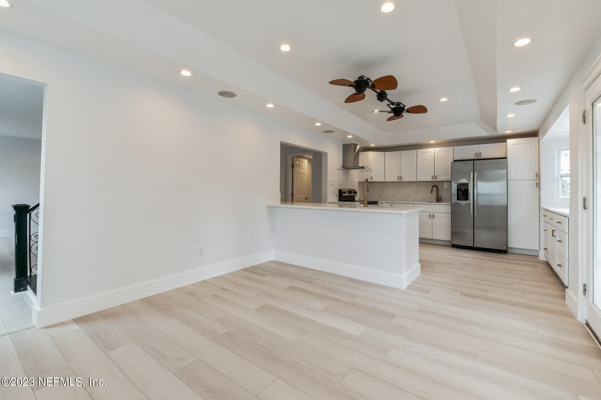 3307 Trout River Boulevard Jacksonville, FL 32208 - Photo 9 of 37 a view of a kitchen with a sink and stainless steel appliances