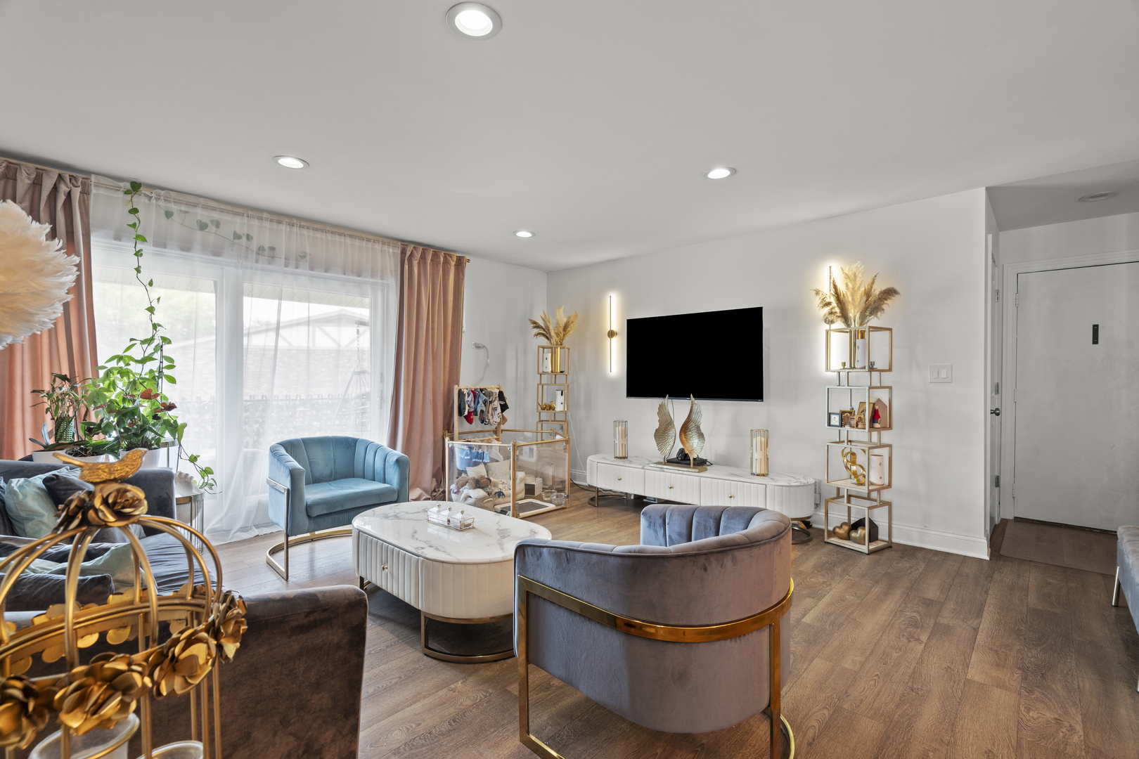 9-s220 S Frontage Road, Unit 210 Darien, IL 60527 - Photo 3 of 14 a living room with furniture and a flat screen tv
