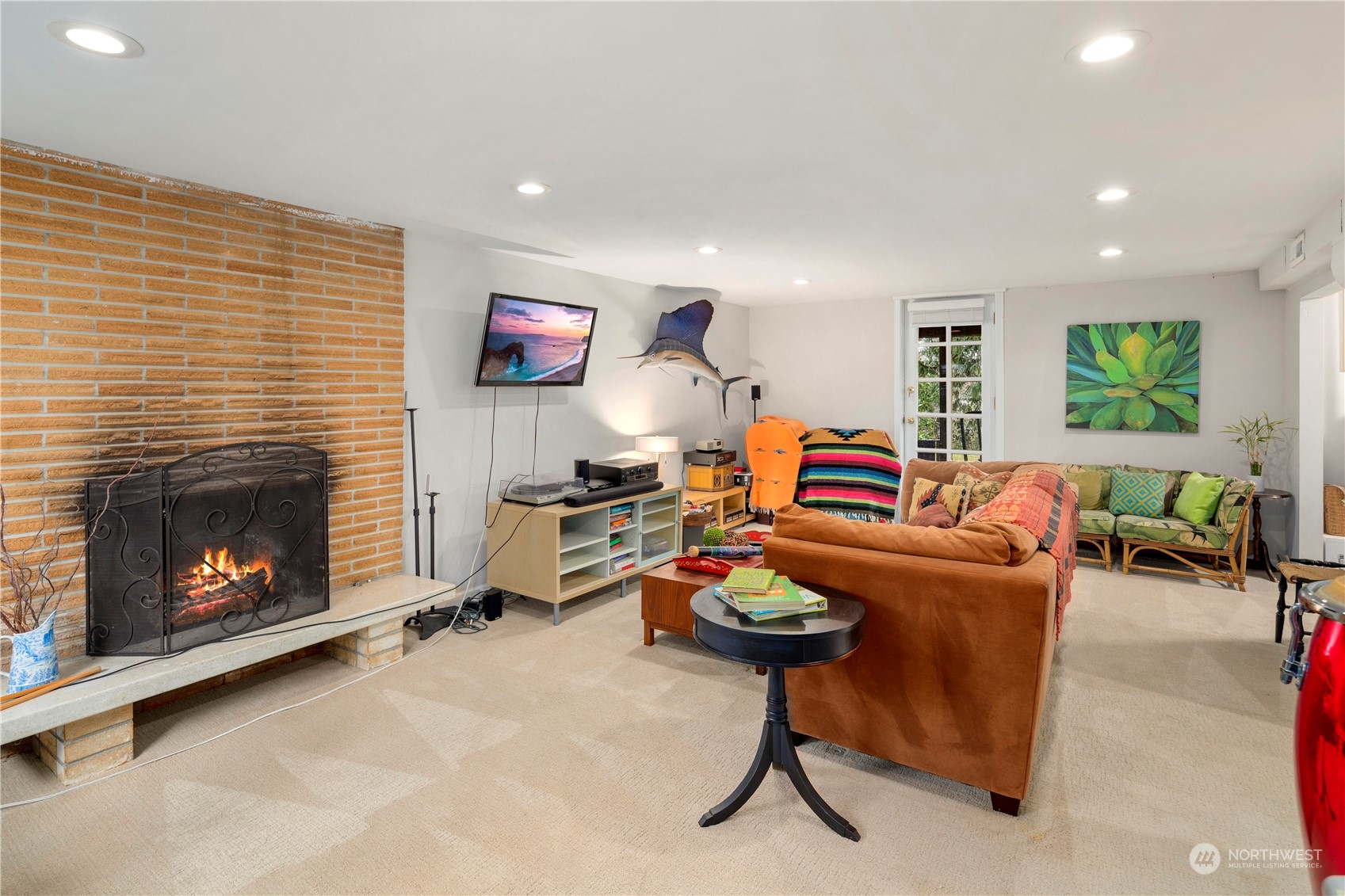 21417 Meridian Drive Southeast Bothell, WA 98021 - Photo 26 of 36 a living room with furniture and a fireplace