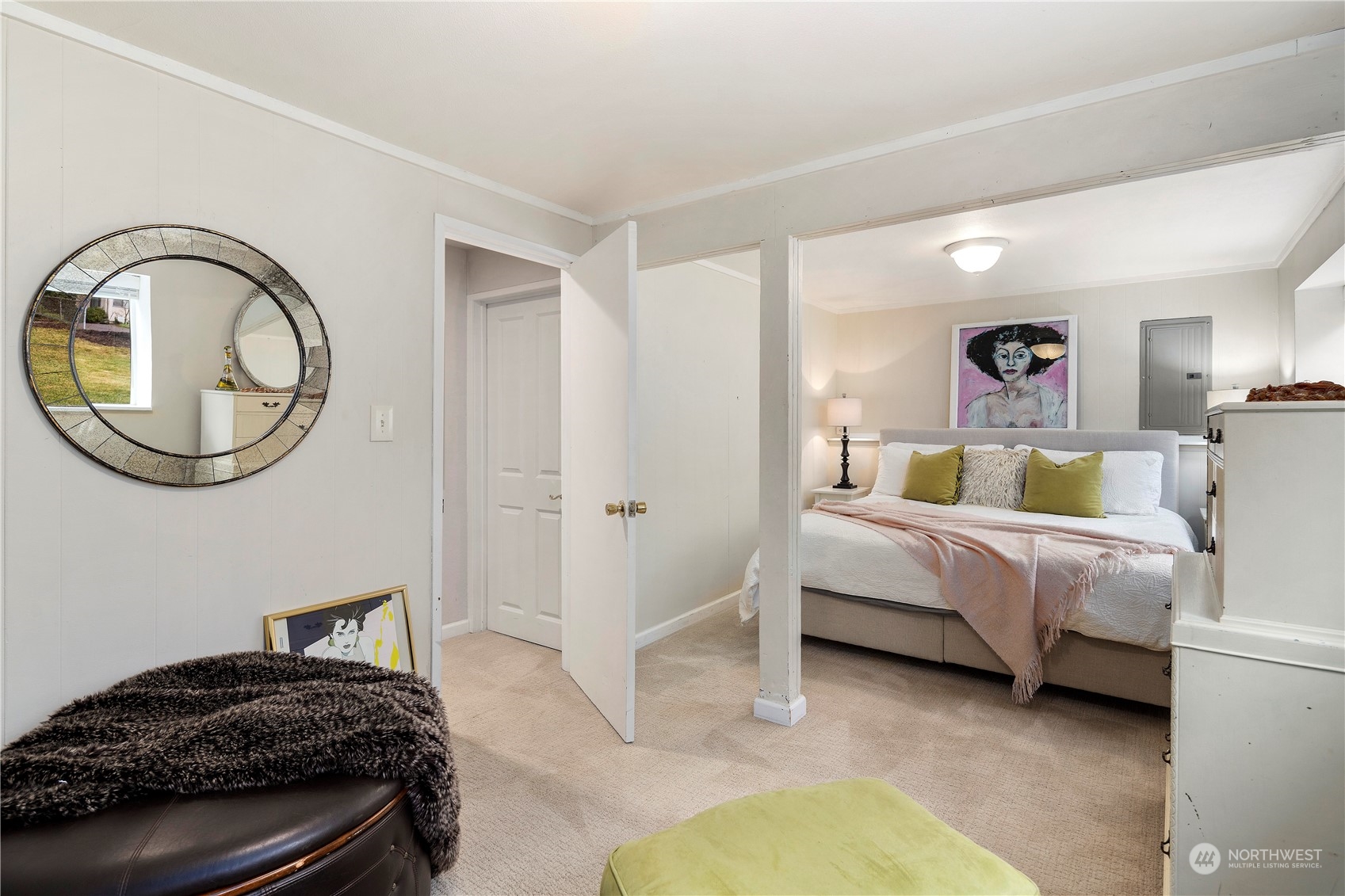 21417 Meridian Drive Southeast Bothell, WA 98021 - Photo 28 of 36 a bedroom with bed and a chandelier
