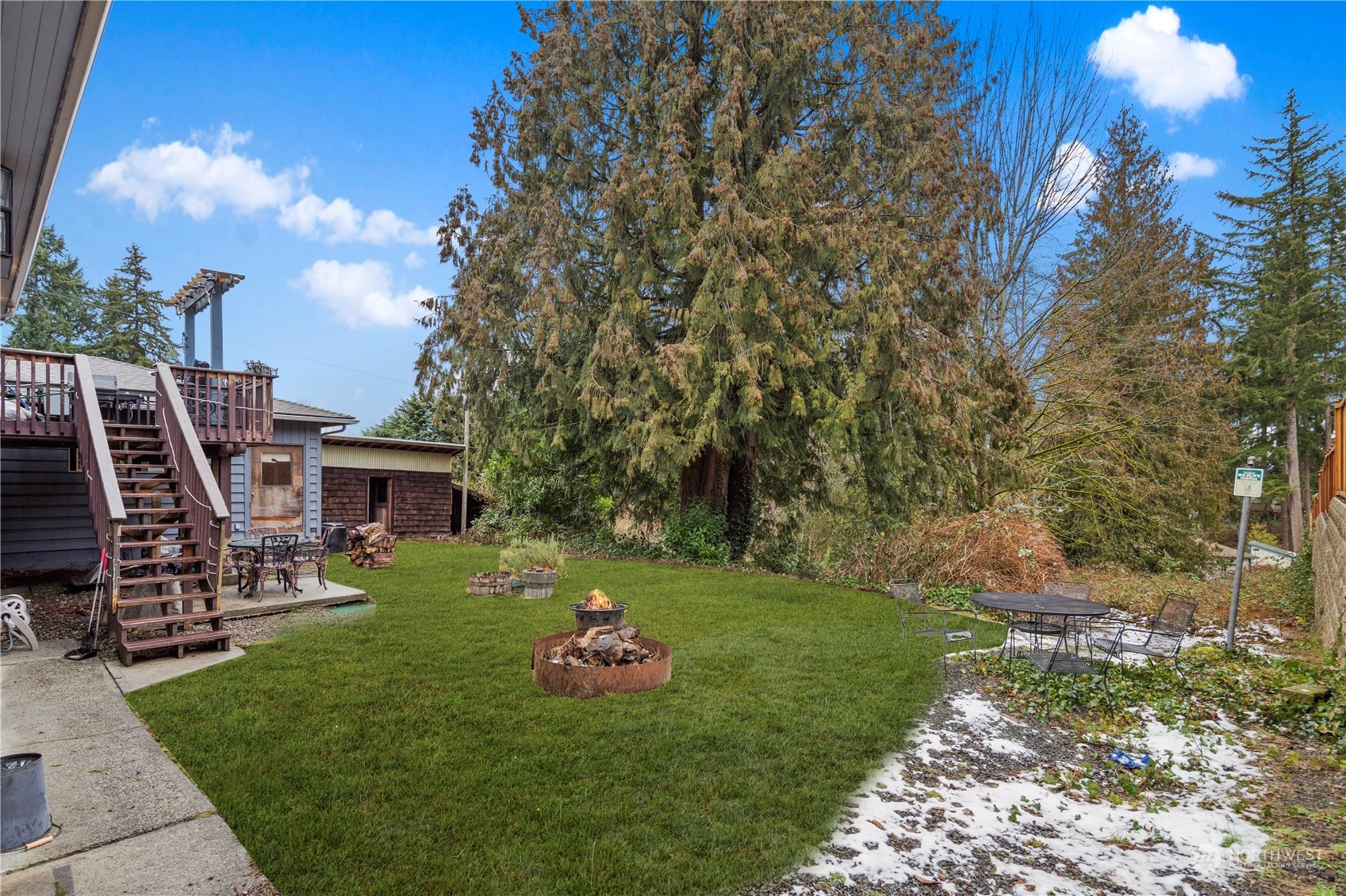 21417 Meridian Drive Southeast Bothell, WA 98021 - Photo 33 of 36 a view of a backyard with sitting area