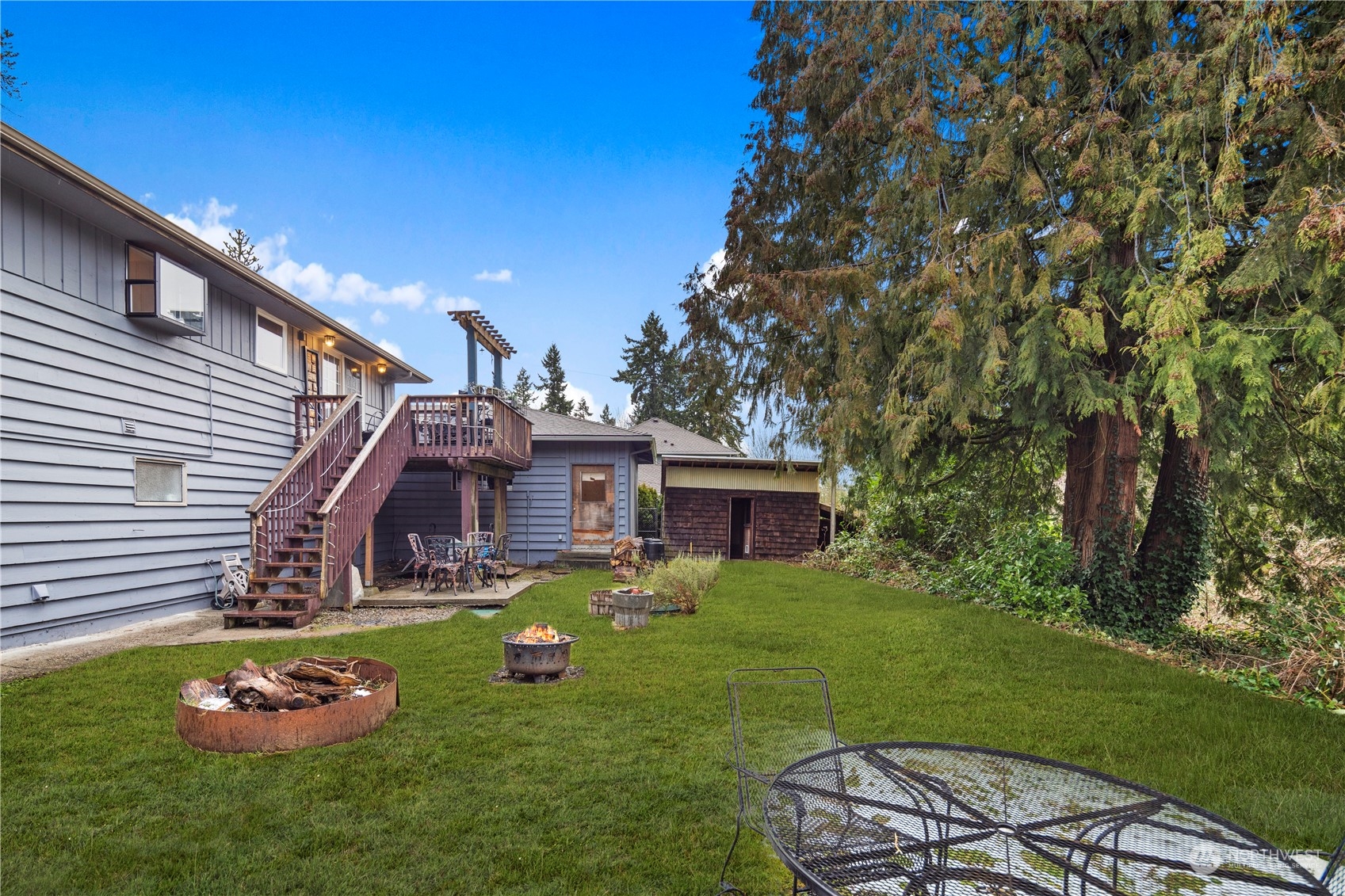 21417 Meridian Drive Southeast Bothell, WA 98021 - Photo 36 of 36 a view of a house with a yard