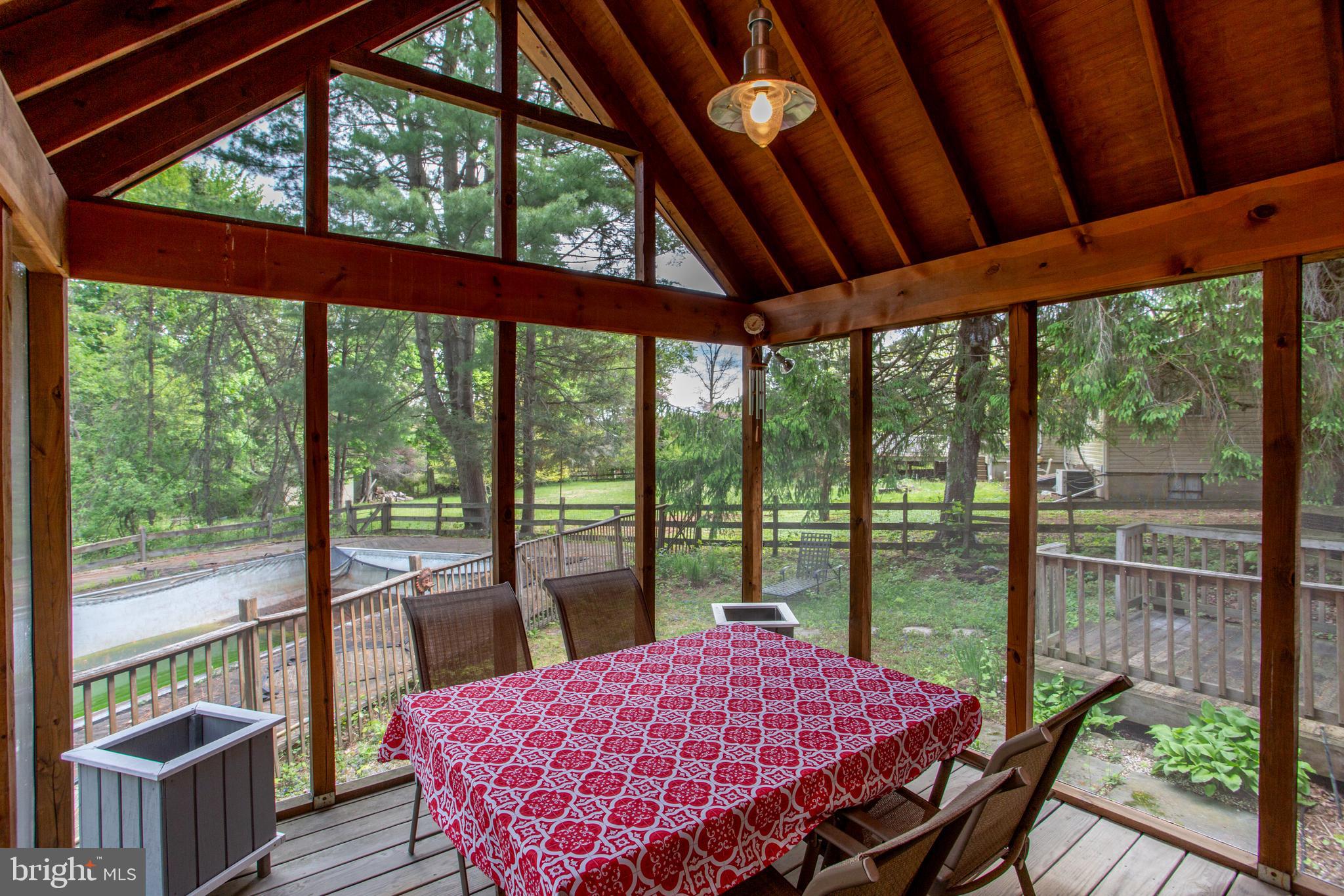 40 Union Road Clinton, NJ 08809 - Photo 27 of 41 Screened deck outside the dining room