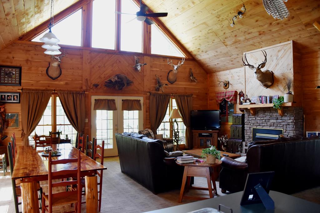 297 Liberty Road Mauk, GA 31058 - Photo 3 of 17 a view of a workspace with furniture and a window